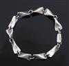 An Edward Klint Larsen for Georg Jensen sterling silver bracelet, no. 104A, 1915-1927 mark, 21cm.                                      