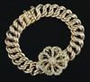 An 18ct gold and diamond set bracelet, gross weight 44 grams.                                                                          