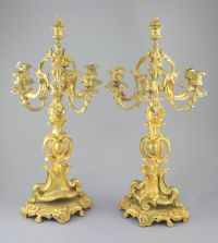 A pair of late 19th century French Louis XV style ormolu seven light candelabra, height 26in.                                          