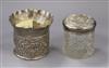 A late Victorian repousse silver cache pot by William Comyns, London, 1891 and silver mounted toilet jar.                              