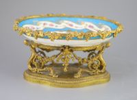 A French Sevres style porcelain and ormolu mounted oval centrepiece dish, 19th century, 28.5cm across                                  