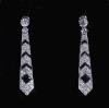 A pair of Cartier Art Deco French platinum, black onyx and diamond set tapering drop earrings, (converted)                                                                                                                  