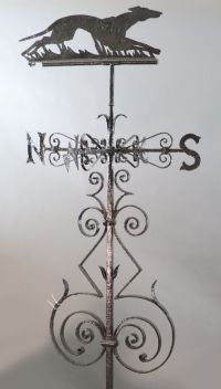 A large Victorian black painted wrought iron weather vane, H.8ft 4in.                                                                  