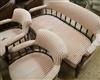 An upholstered settee on mahogany frame and two tub chairs W.140cm                                                                     