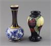 A small Moorcroft 'wisteria' pattern vase and a Macintyre bottle vase                                                                  