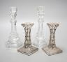 A pair of Tiffany & Co. glass candlesticks and a pair of silver overlaid glass candlesticks 20cm                                                                                                                            