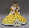 A Royal Dux figure of lady in a yellow dress (17543) height 26cm                                                                       