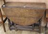 An 18th century oak gateleg table, with drawers W.95cm                                                                                 