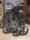 A pair of wrought iron fire dogs W.21cm                                                                                                