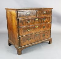 A George III featherbanded walnut chest W.3ft 2.5in. D.1ft 11in. H.3ft                                                                 