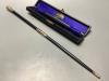 A George V silver mounted ebonised conductors baton in case, 45.3 cm.                                                                                                                                                       