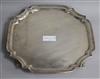 A George V silver shaped square salver, Viner's Ltd, London, 1935, 34.3cm.                                                             