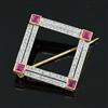 A mid 20th century gold, ruby and diamond square openwork brooch, 21mm.                                                                