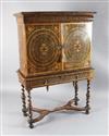 A William and Mary laburnum oyster veneered and crossbanded cabinet on stand, W.3ft 4in. D.1ft 6in. H.4ft 11in.                        