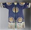 A Chinese noblewoman's embroidered silk midnight blue surcoat (longgua), late 19th century, 138cm long, minor alterations to sleeves an