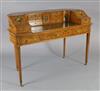 An Edwardian painted satinwood Carlton House desk, W.4ft 4in. D.1ft 11in. H.3ft 2in.                                                   