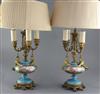 A pair of Sevres style porcelain and ormolu mounted table lamps, late 19th century, total height 60cm                                  