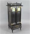 An Aesthetic movement ebonised music cabinet, in the manner of Morris & Co., W.30in.                                                   