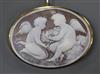 A 20th century Italian 750 yellow metal mounted oval cameo brooch, monogrammed F.F. and carved with two cherubs,                       