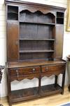 A mid 18th century oak dresser, with later upper section W.131cm                                                                       