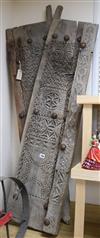 A pair of Indian carved hardwood shutters height 140cm                                                                                 