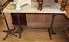 A Victorian marble top wrought iron garden table W.106cm                                                                               