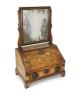 A mid to late 18th century Dutch walnut and marquetry toilet mirror bureau                                                                                                                                                  