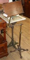 A Victorian Norths patent cast iron and brass reading table H.120cm                                                                    