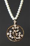 An early 20th century, gold, pearl and diamond set circular pendant necklace,                                                          