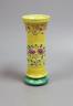A 19th century Chinese (Qing) yellow background vase, 15 cms high.                                                                                                                                                          