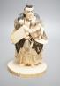A Japanese ivory figure of a Yamabushi warrior monk, Taisho/early Showa period, signed to a lacquer tablet - 18.5cm tall                                                                                                    