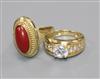 Two 14ct gold rings including one set with cubic zirconia.                                                                             