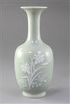 A Chinese celadon ground bottle vase, 19th century, height 26cm                                                                        