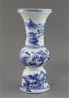 A Chinese blue and white beaker 'landscape' vase, gu, Kangxi period, H. 30.5cm, lean to one side                                       