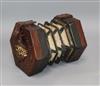 An A C. Wheatstone rosewood 48 key concertina, no case                                                                                 