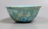 A Persian turquoise glazed fritware bowl, 12.5 cms diameter.                                                                                                                                                                