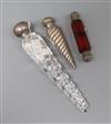 Three silver mounted glass scent bottles, including double ended and two teardrop, largest 21.6cm.                                     