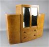 An Art Deco birds eye maple display cabinet and similar dining table,                                                                  