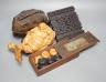 A Chinese carved wood frog, 22cm long, a carved Buddha, woodblock and a part-set of draughtsmen                                                                                                                             