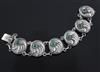 A Danish Georg Jensen 830S and green chalcedony cabochon set bracelet, no. 19, 1915-1930 mark, 19cm.                                   