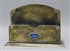 A Cambray ware enamel and brass letter rack H:13cm. W:19cm.                                                                            