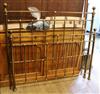 A brass framed bed W.145cm                                                                                                             