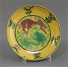 A Chinese yellow ground green and aubergine enamelled 'dragon' dish, Guangxu mark and possibly of the period, D. 11cm                  