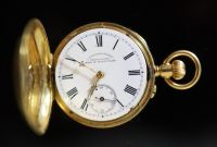 An early 20th century Swiss engine turned 18k gold hunter keyless fob watch,                                                           