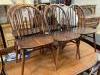 A set of six Ercol elm and beech Windsor dining chairs                                                                                                                                                                      