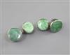 A pair of Chinese jadeite and silver mounted cuff links, late 19th/early 20th century, total length 3.2cm                              