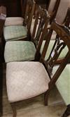 An Edwardian marquetry inlaid mahogany six piece boudoir suite, consisting of a lady's and gentleman's chair and four boudoir chairs   