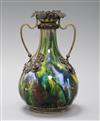 An Austro Hungarian enamelled white metal vase with jewelled decoration                                                                