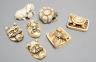 Seven Japanese ivory netsuke- three noh masks, two turtle groups, a ram, pumpkin and rats, Taisho/early Showa period, signed                                                                                                
