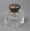 A George V silver mounted glass inkwell, Birmingham, 1919, 10.8cm.                                                                     